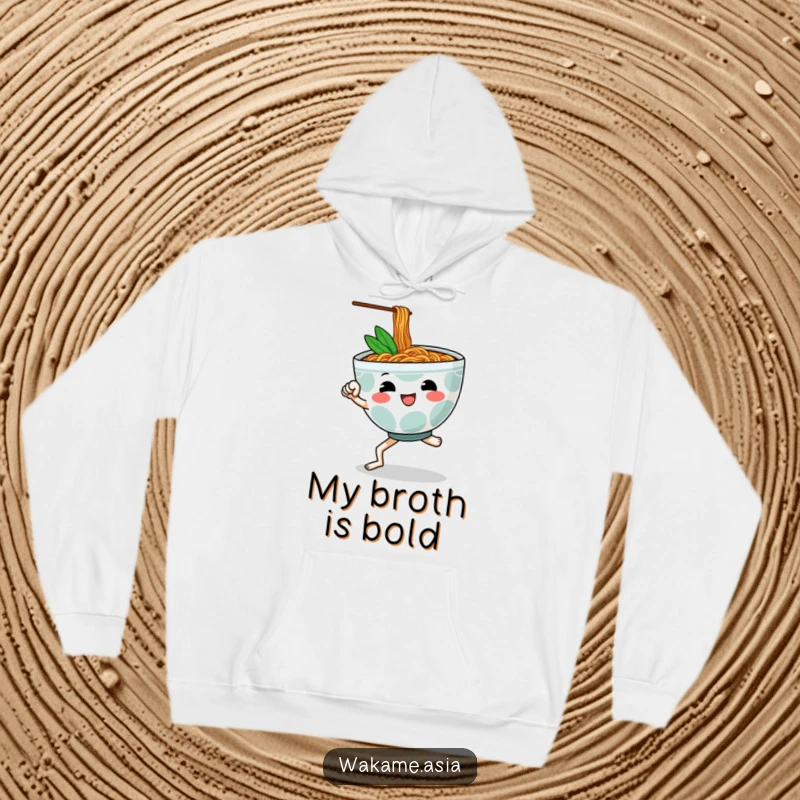 Funny hoodie featuring a cheerful, anthropomorphic ramen bowl with legs executing a dynamic martial arts kick, offering cozy style.
