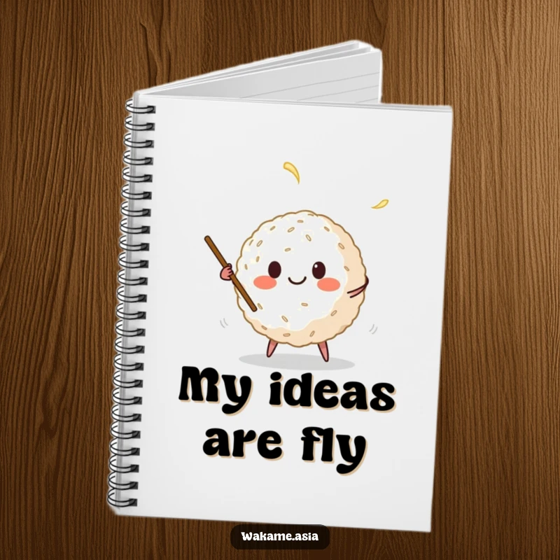 Funny notebook with a smiling anthropomorphic rice ball juggling chopsticks, perfect for jotting down ideas with a humorous food character cover.