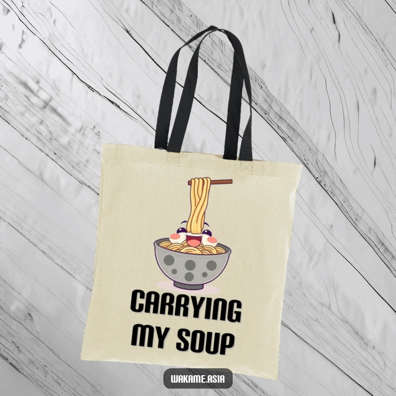 Funny tote bag featuring a happy ramen bowl character enthusiastically slurping noodles upwards.
